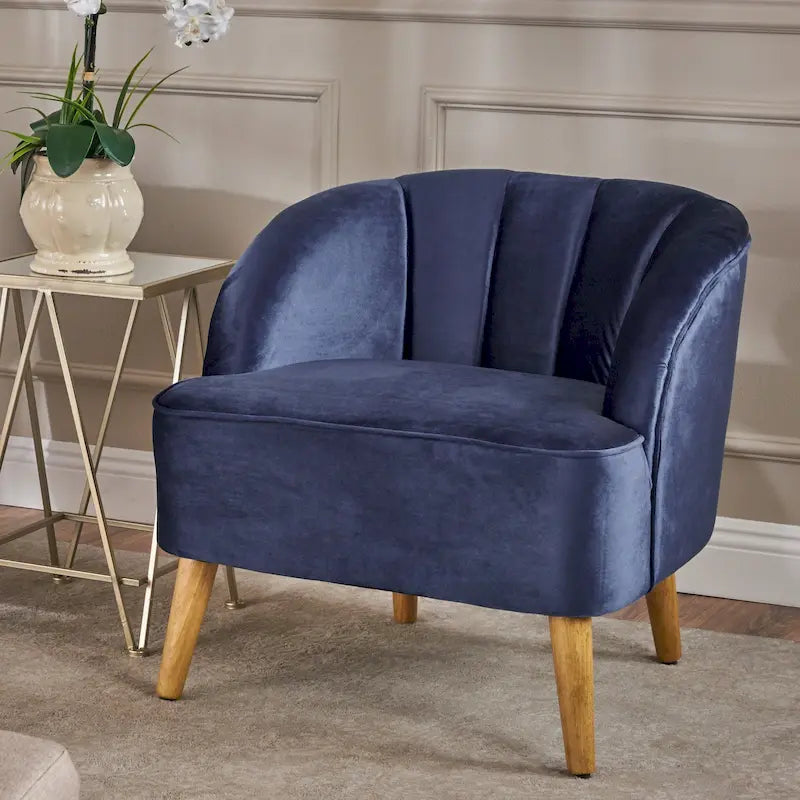 Fauteuil club moderne en velours avec pieds en bois de bouleau