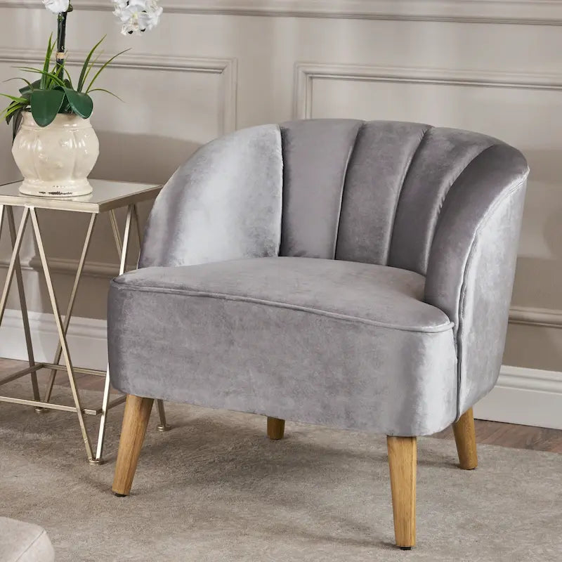 Fauteuil club moderne en velours avec pieds en bois de bouleau