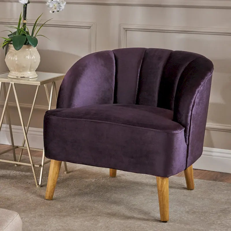 Fauteuil club moderne en velours avec pieds en bois de bouleau