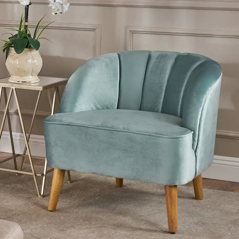 Fauteuil club moderne en velours avec pieds en bois de bouleau