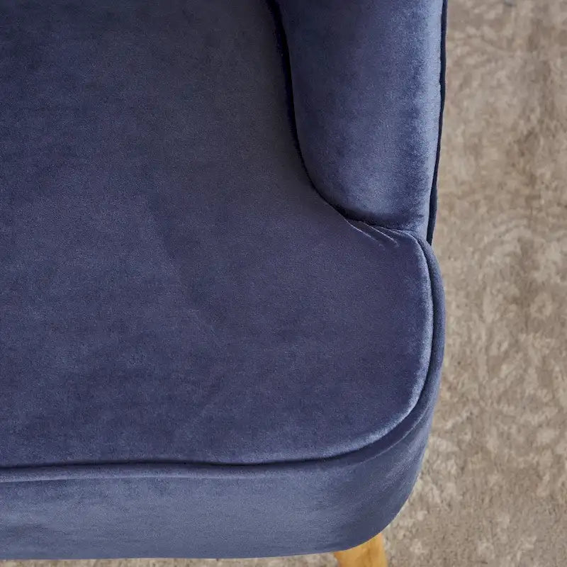 Fauteuil club moderne en velours avec pieds en bois de bouleau