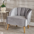 Fauteuil club moderne en velours avec pieds en bois de bouleau