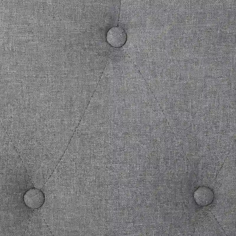 Lit rembourré gris avec tête de lit capitonnée et oreilles